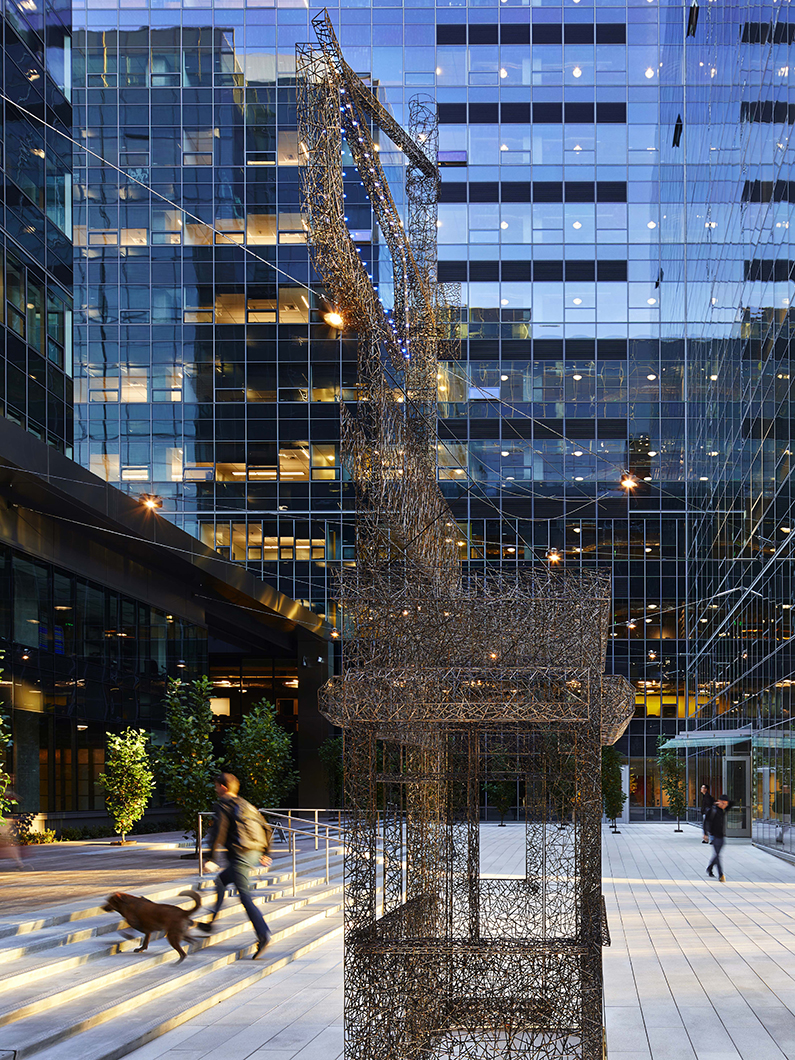 Abstract metal sculpture in open air courtyard