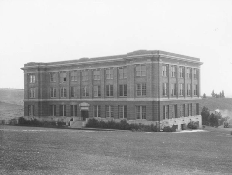 Black and white historic photo of the original 1920s Troy Hall building