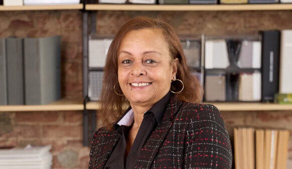 Headshot of Shawn Bullock in an architectural office setting.