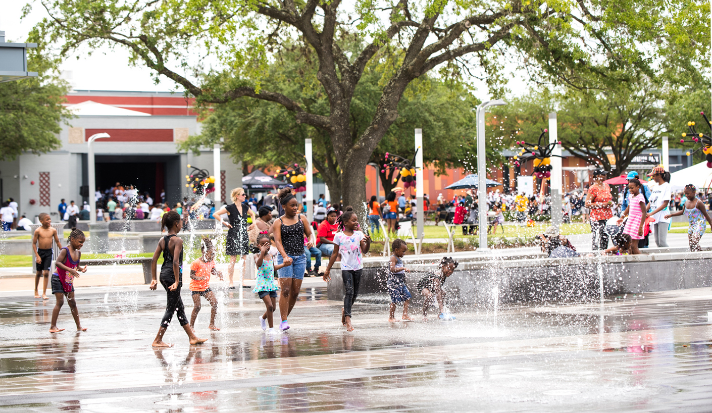 children play in fountain at Emancipation Park