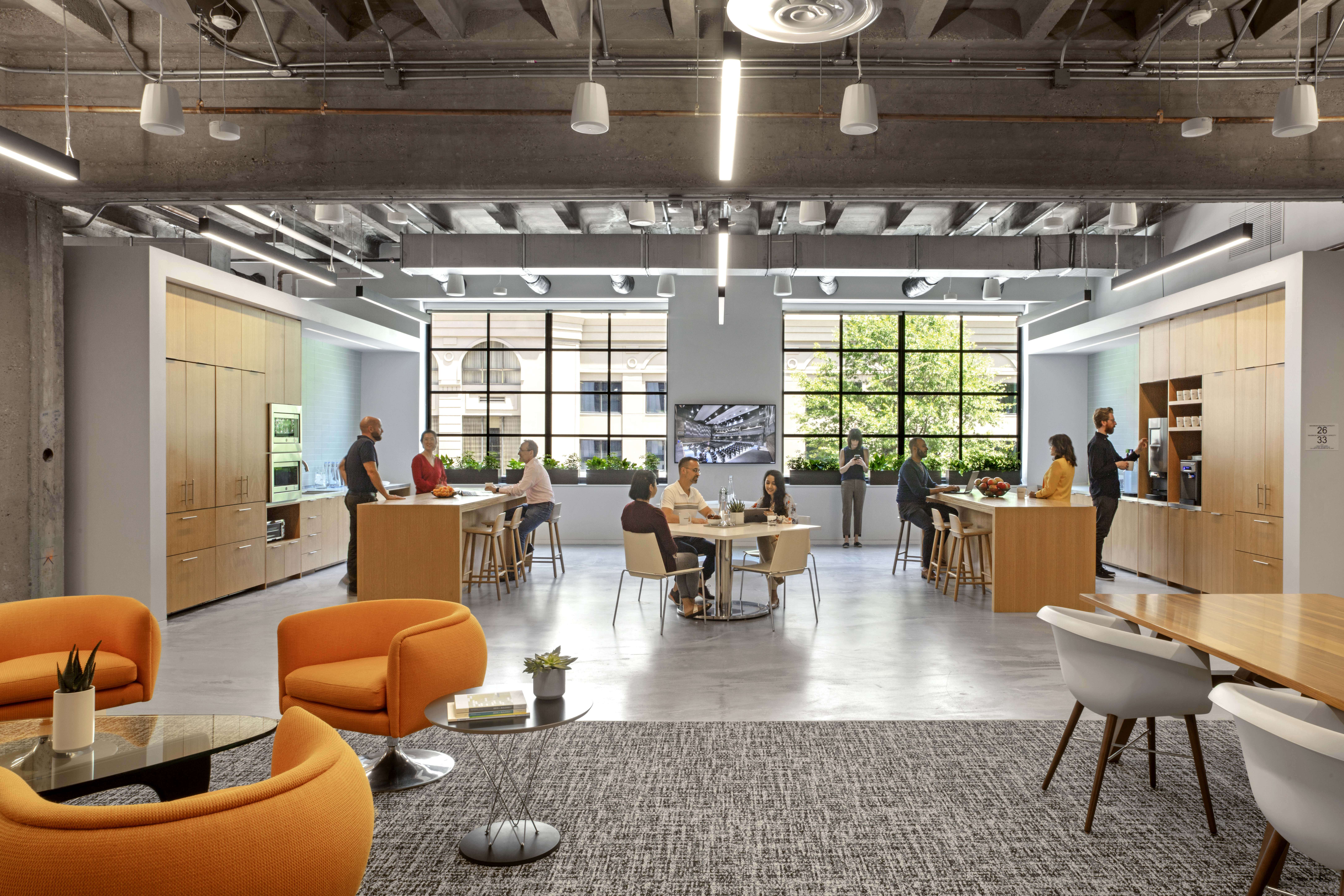 Sustainable office design strategies include salvaging millwork and reusing furniture.