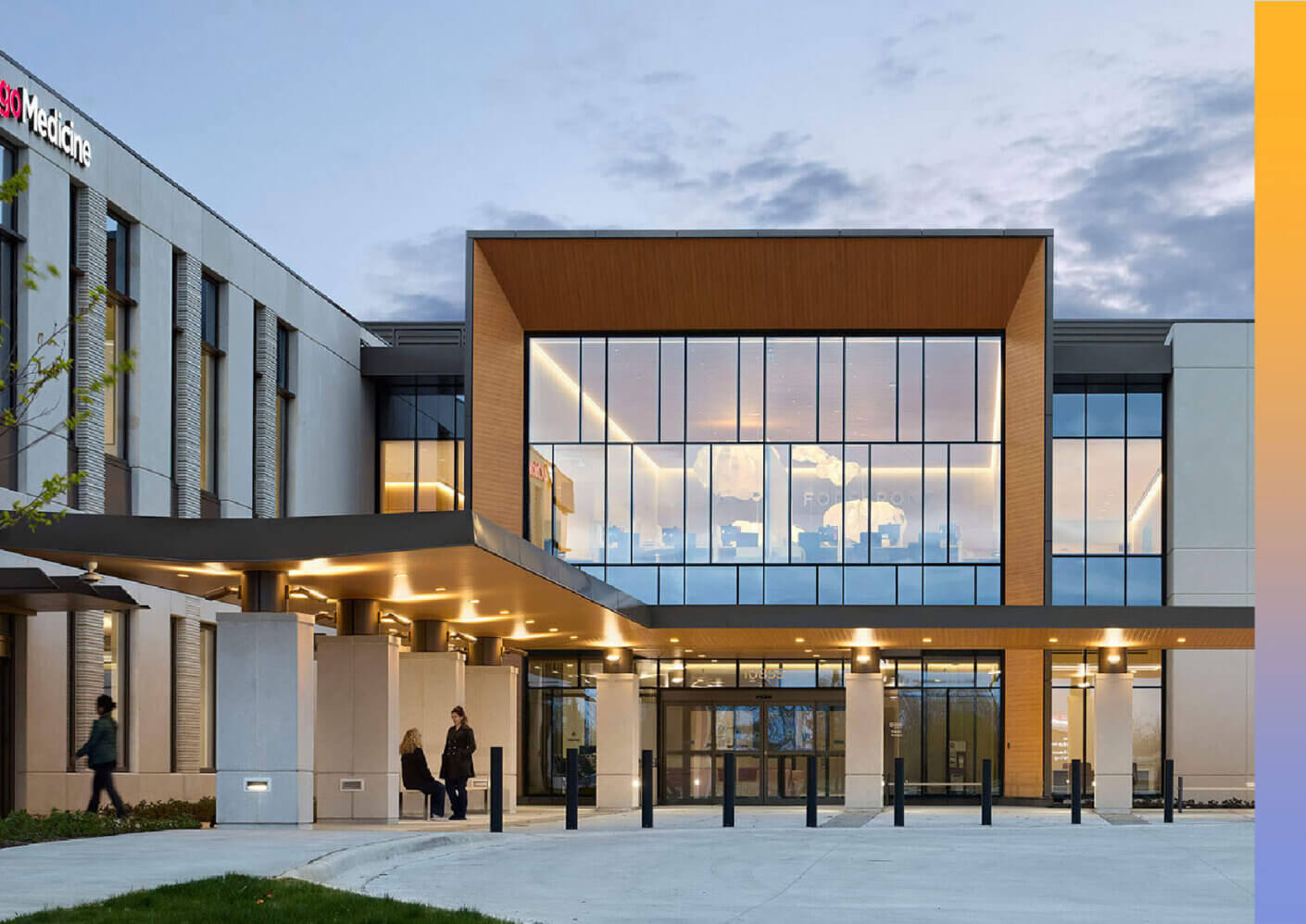 the front entrance of a two-story hospital