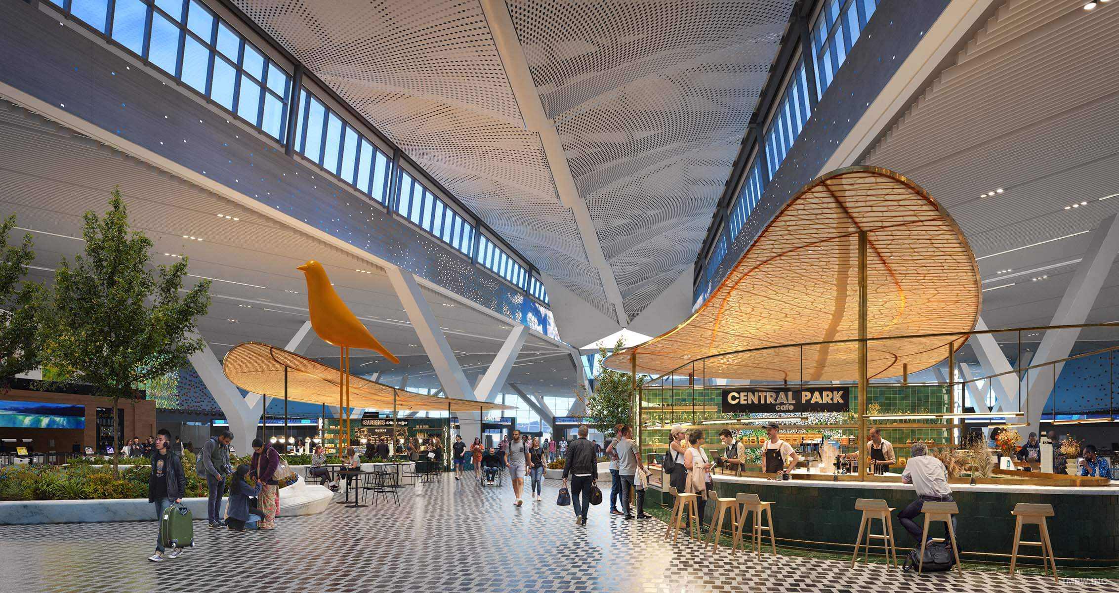 a large airport concourse with landscaping and a food stall