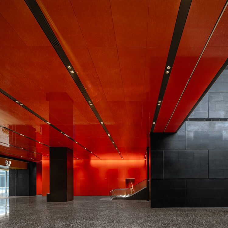 Red and black lobby with escalator