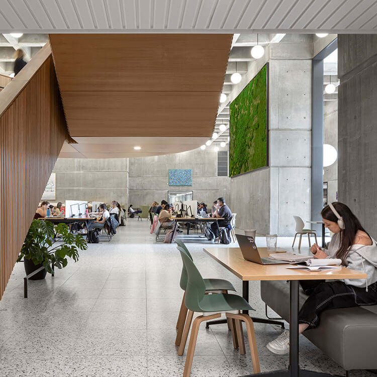 Study space under staircase leading into open work area