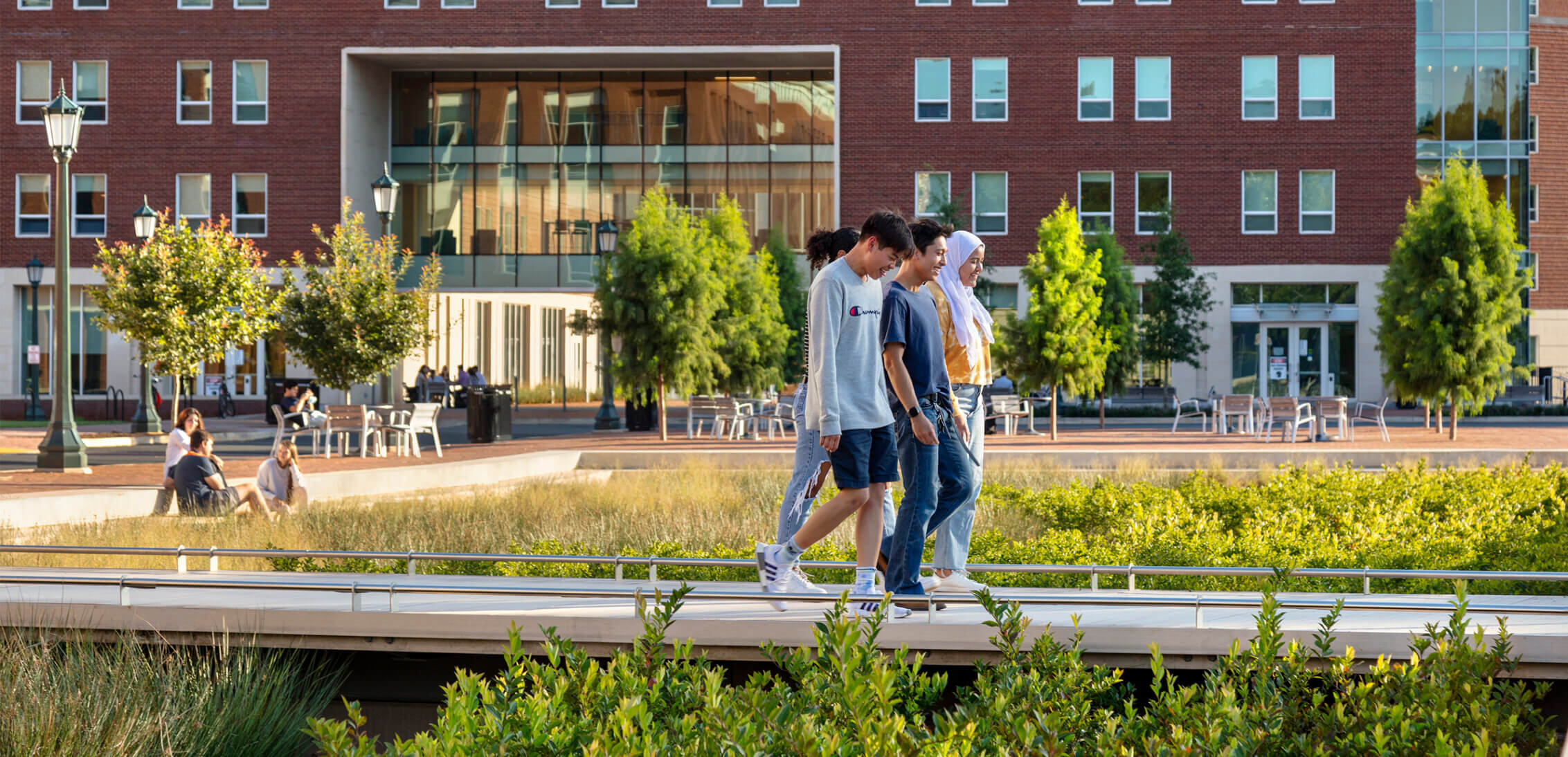 Students walking through landscape at the University of Virginia.