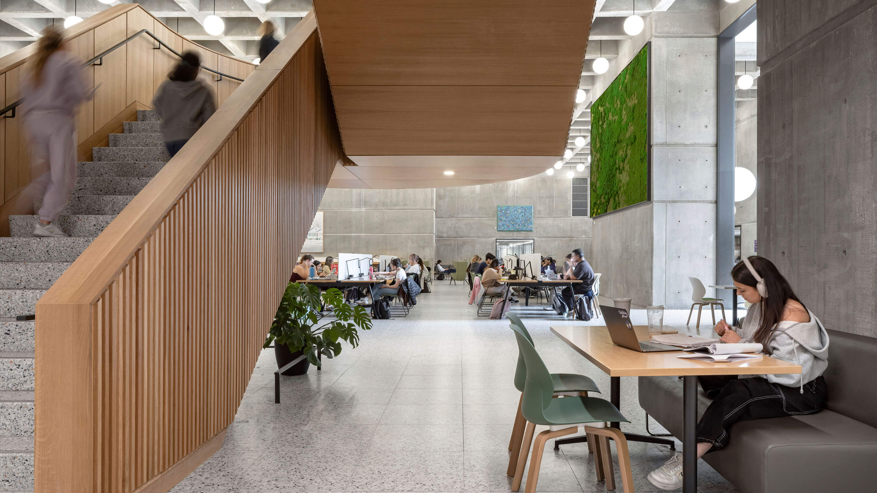 Study space under staircase leading into open work area