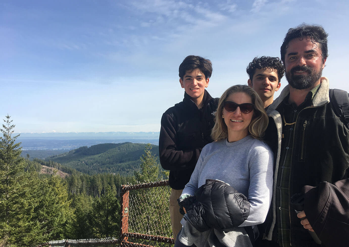 a family on a mountain overlook