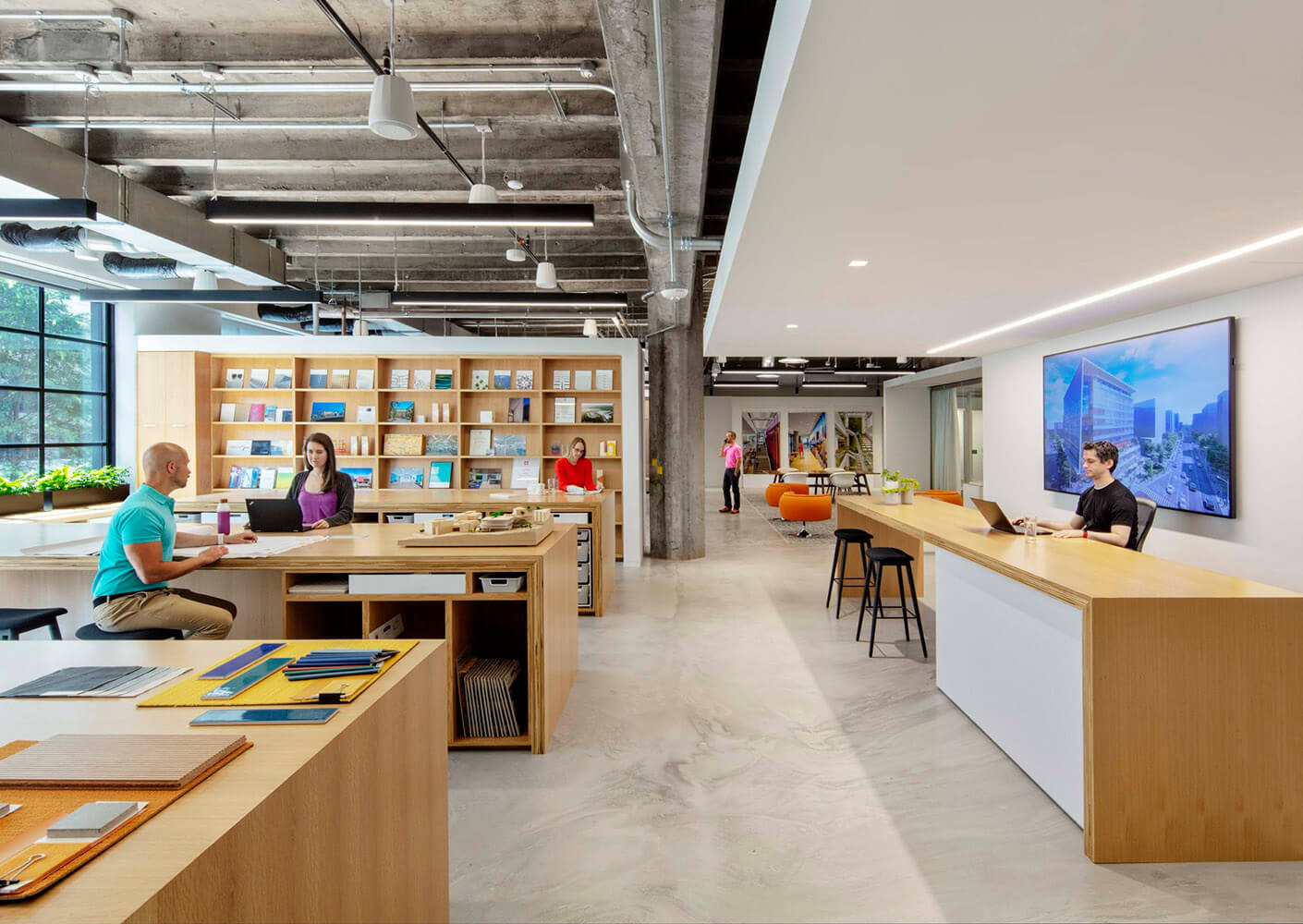 a studio space with wooden tables