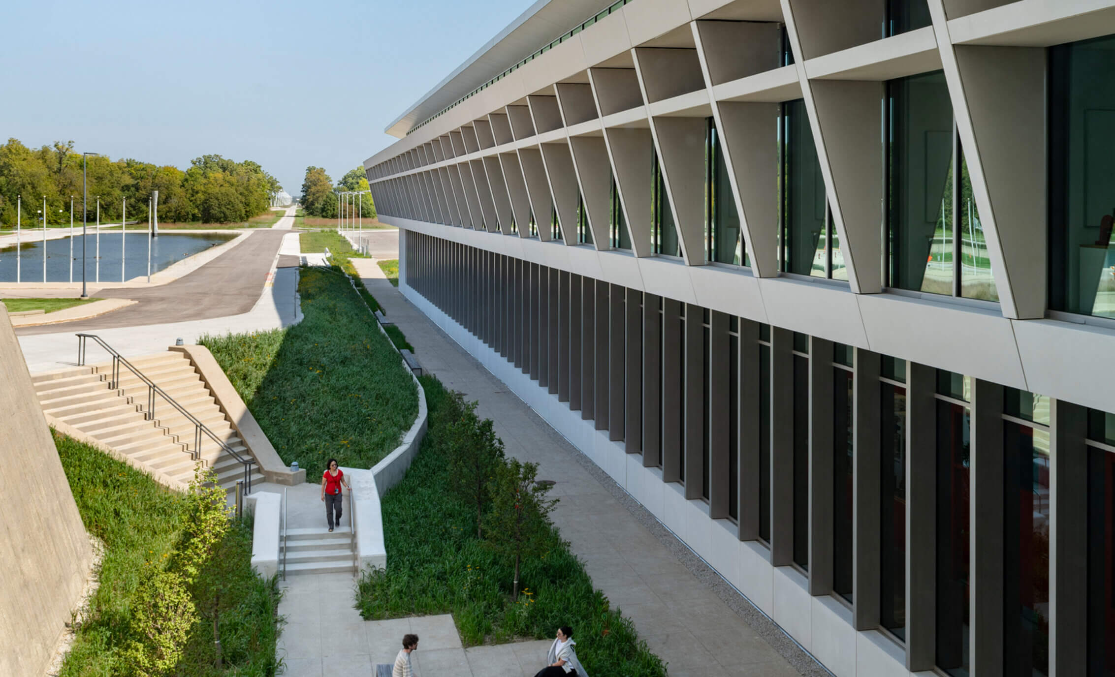 Looking down at the side view of a lab building and courtyard from outside the building's second floor