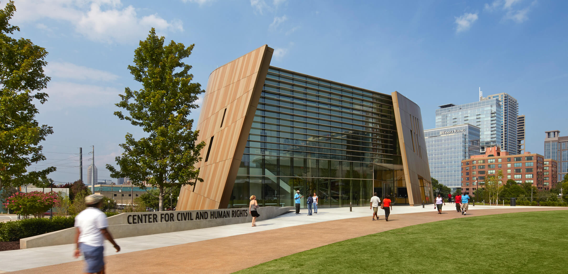 Exterior view of the museum with people in the foreground.