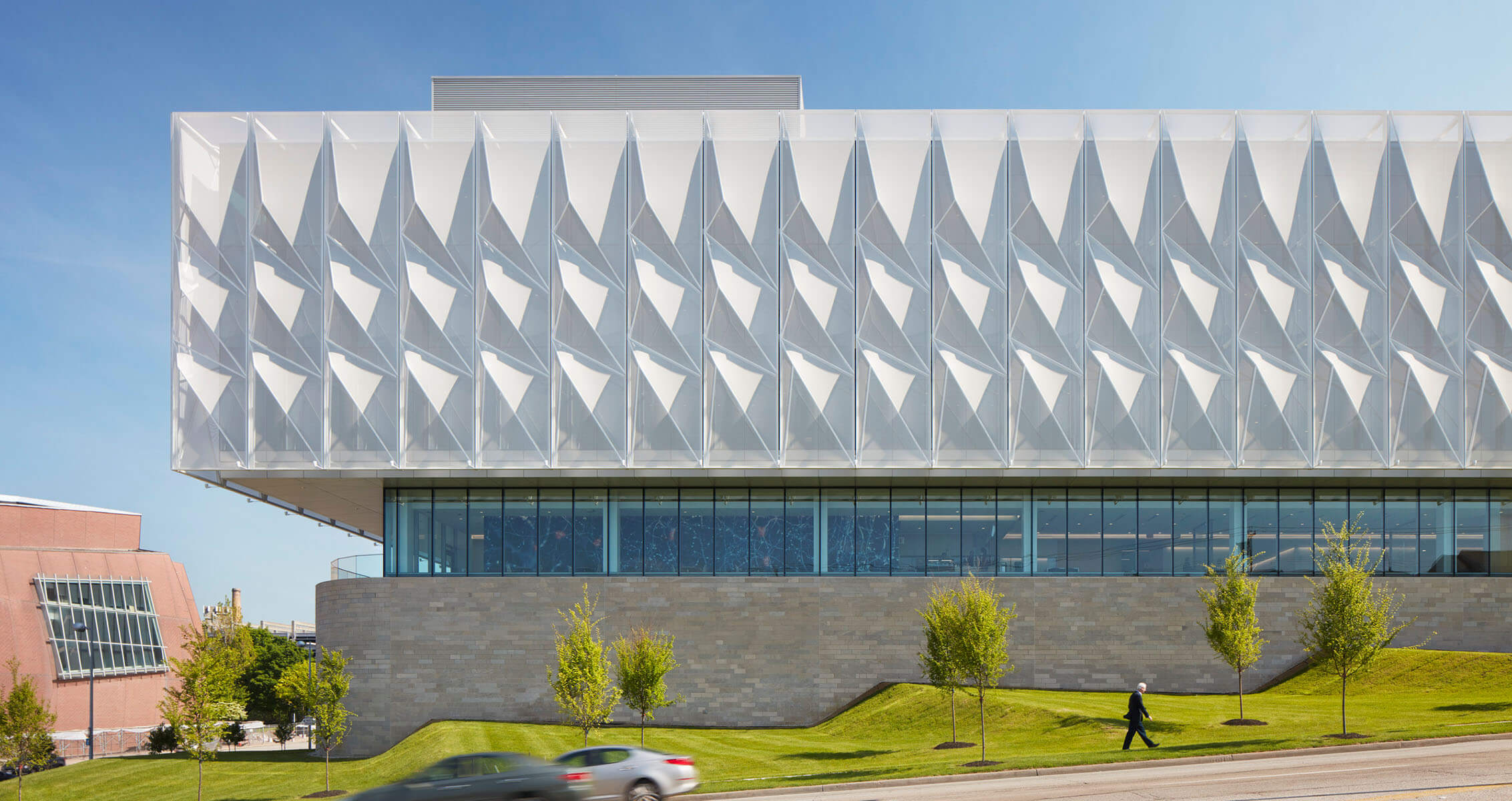 A large pavilion with a geometric facade