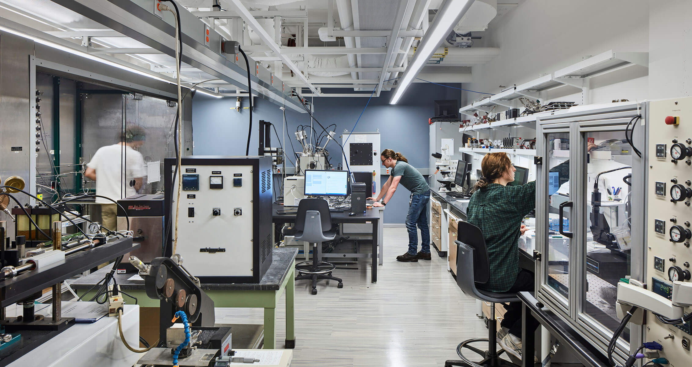 Robotics lab with people working