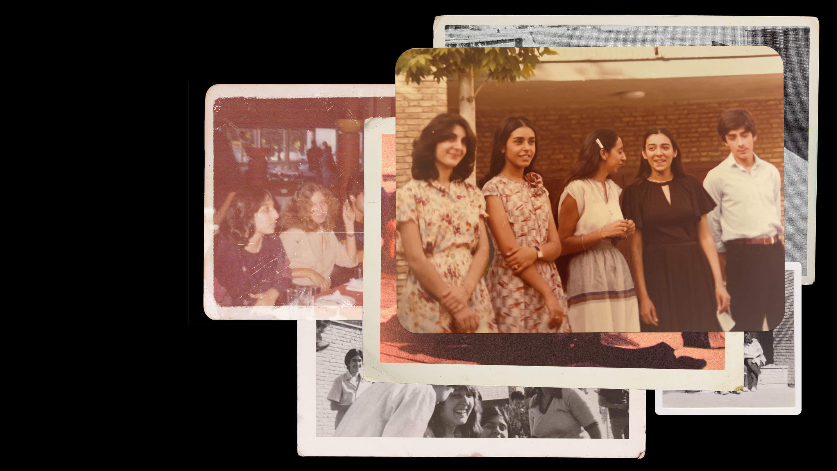 A stack of old photographs of high school students.