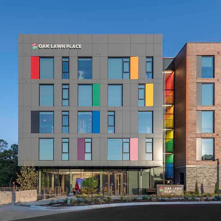 The colorful facade of the Oak Lawn Place development