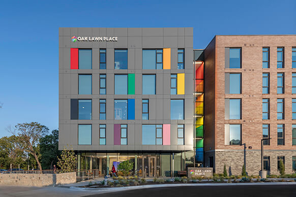 The colorful facade of the Oak Lawn Place development