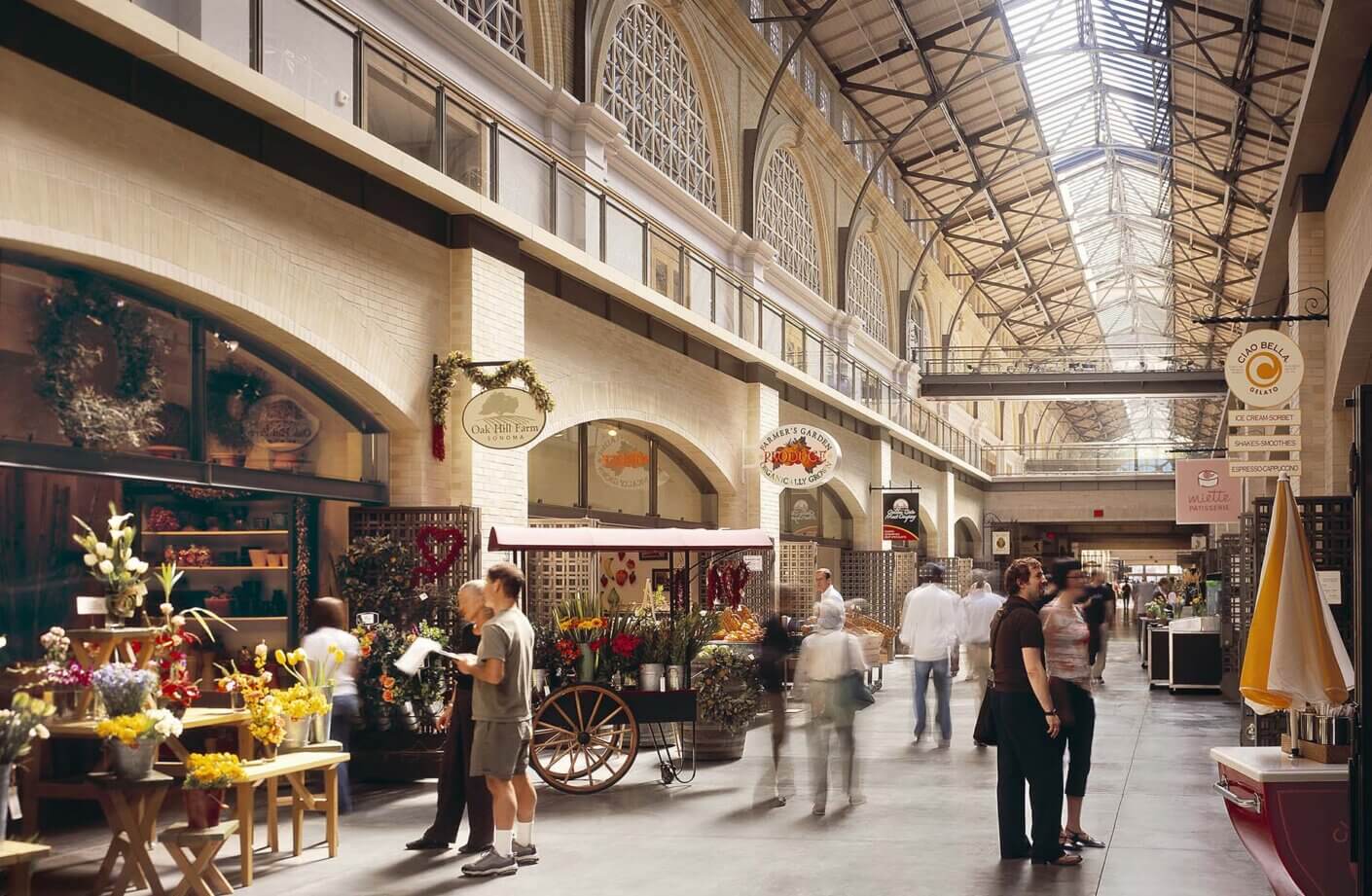 interior of the ferry building concourse with patrons at local shops