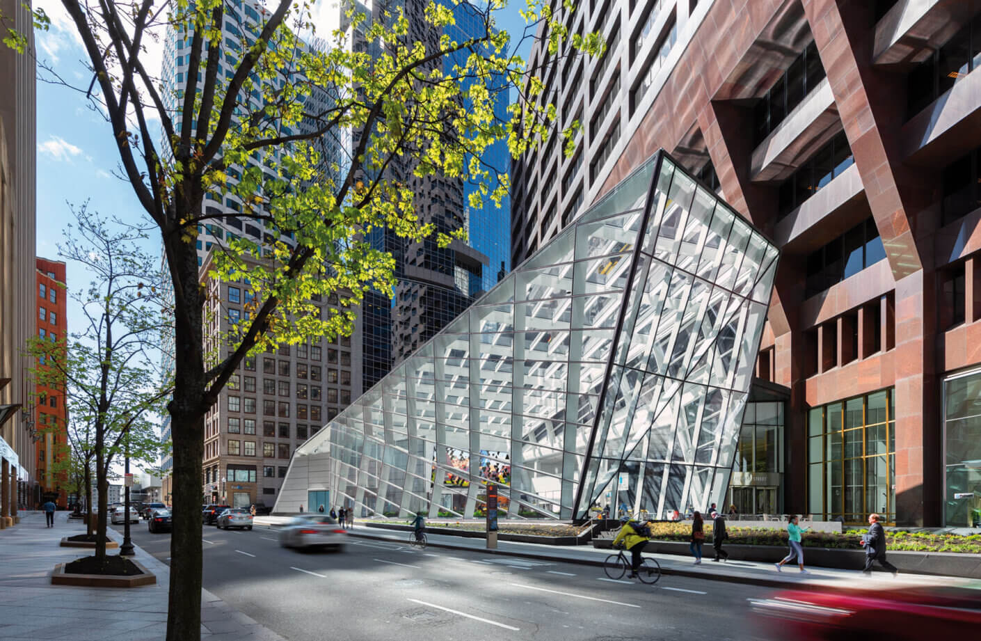 glass building next to busy urban street