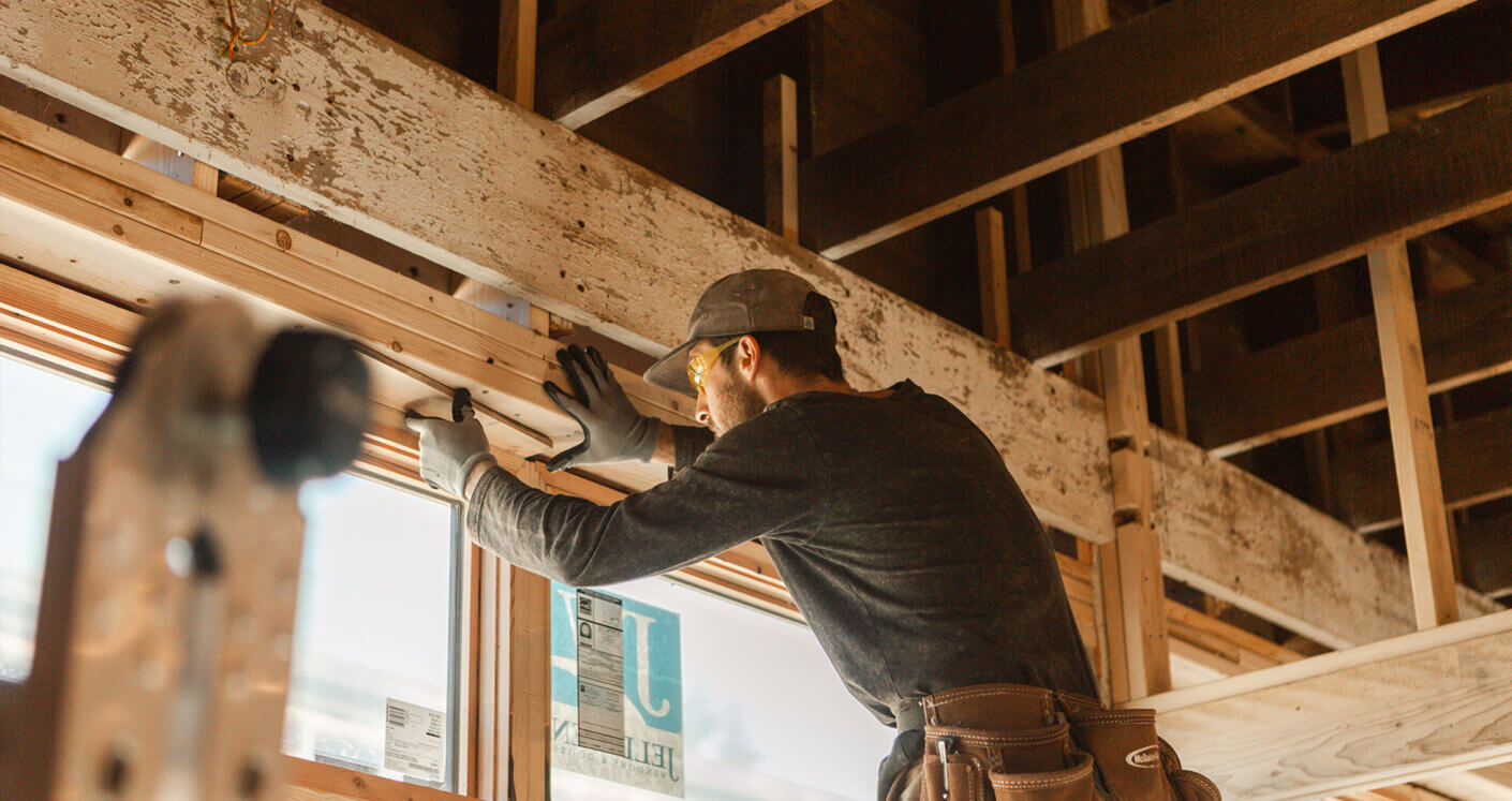 craftsperson working on building interior