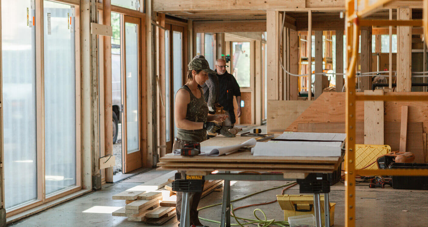 craftspeople restoring the building