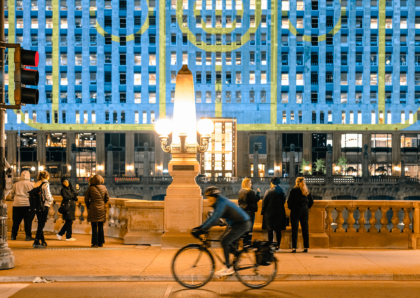 Bike rider in front of building