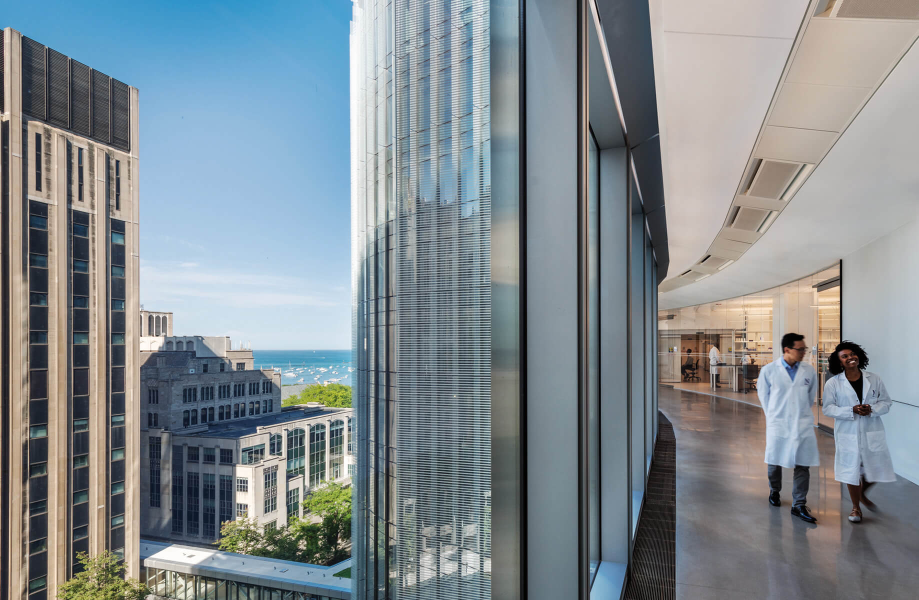 view of the interior of a research center with lake michigan visible in the background