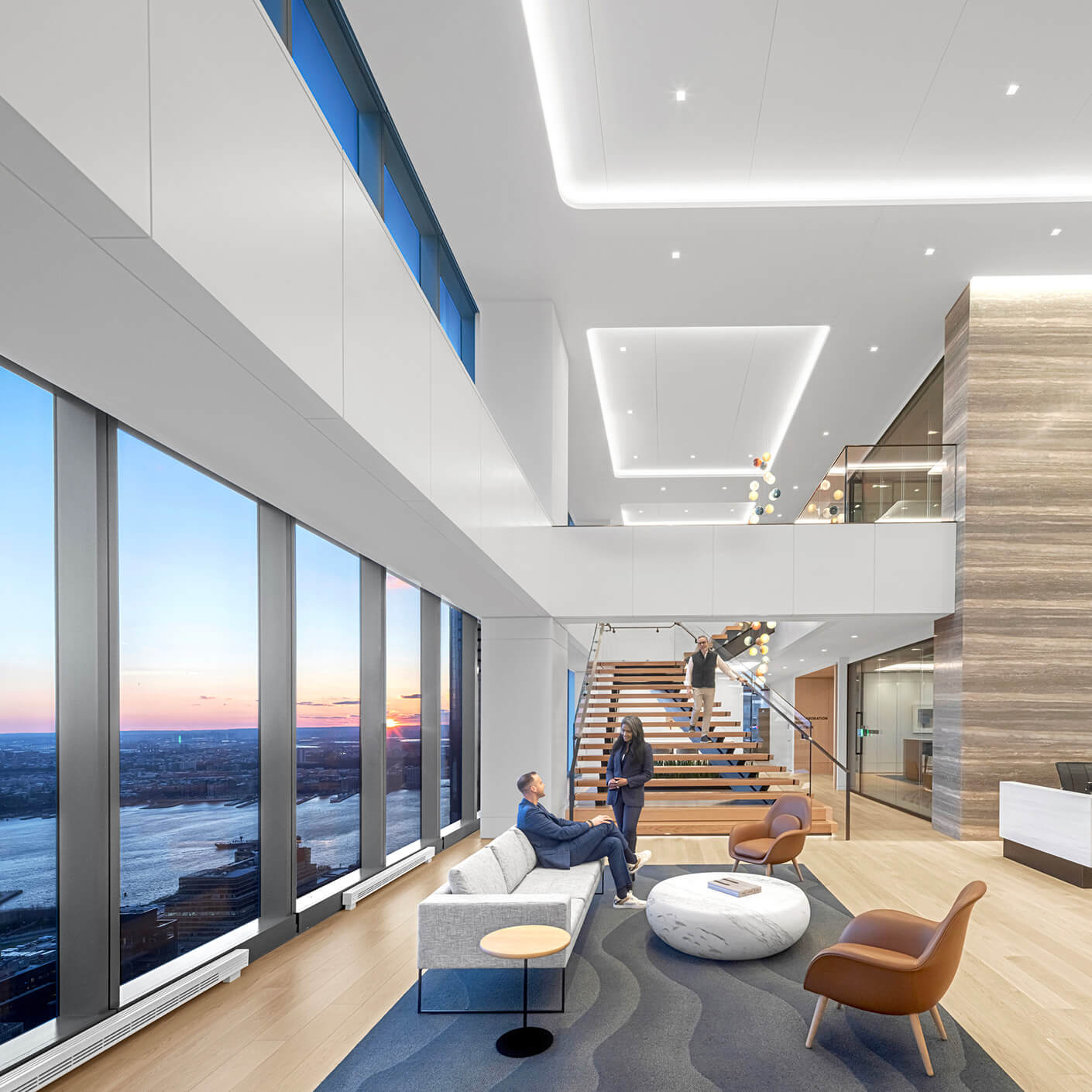 Lobby of office during sunset with large stair in back
