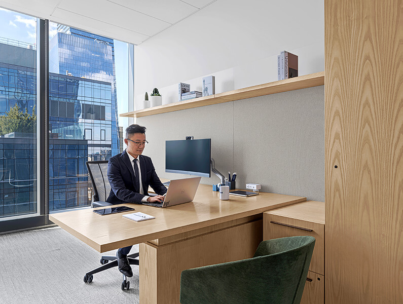 person working in a private office