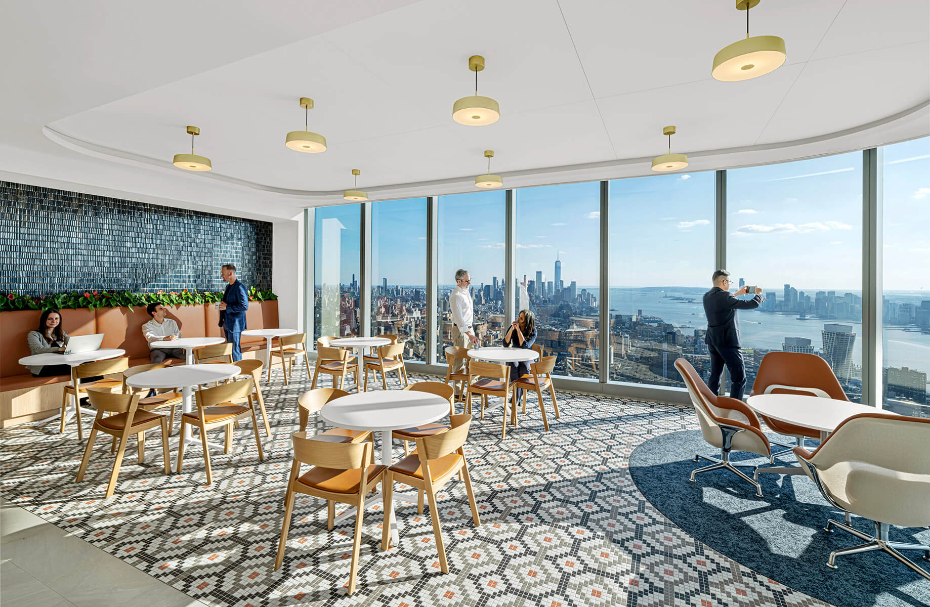 Dining / event room with people looking at views out the large window