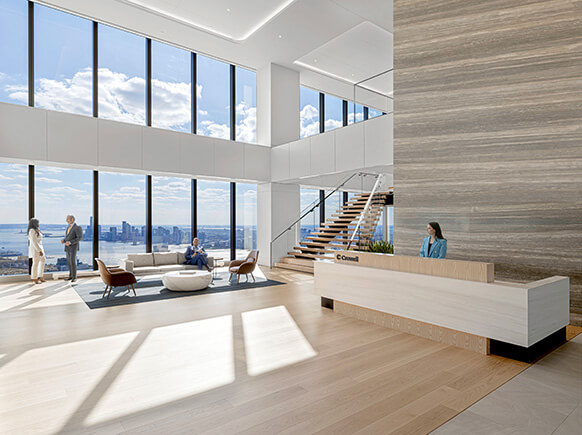 Entry lobby of office with large window with view to city