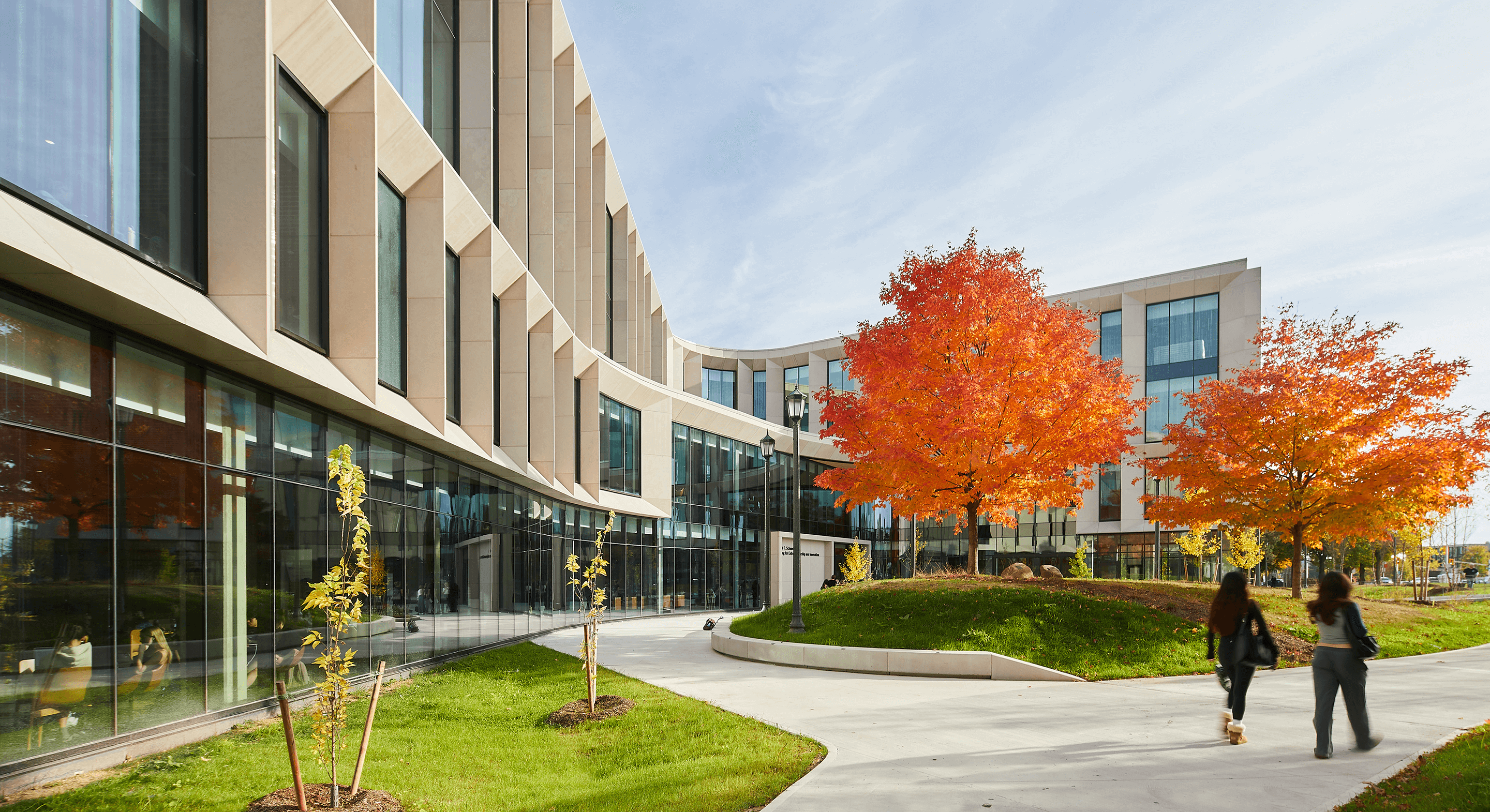 View of Ronald D. Schmeichel Building for Entrepreneurship and Innovation's main entrance with fall foliage.