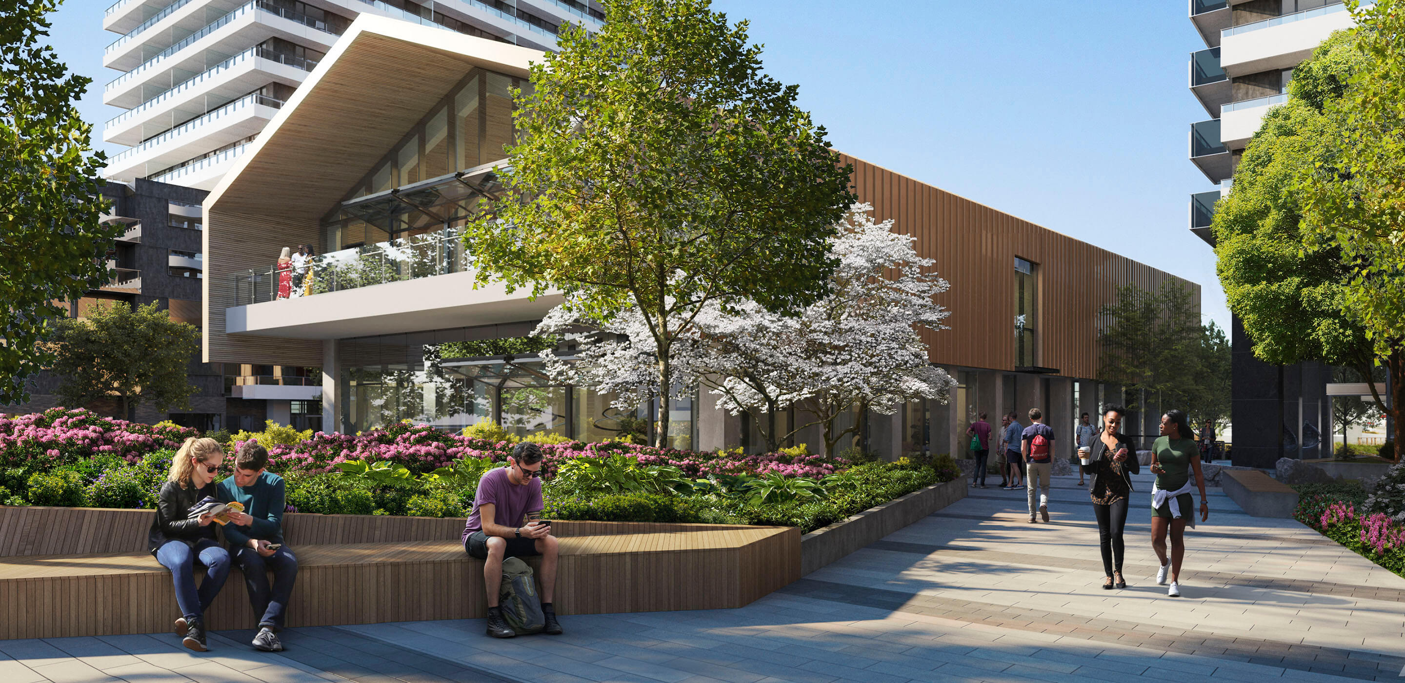 Modern urban plaza with people relaxing and walking, surrounded by trees and contemporary architecture.