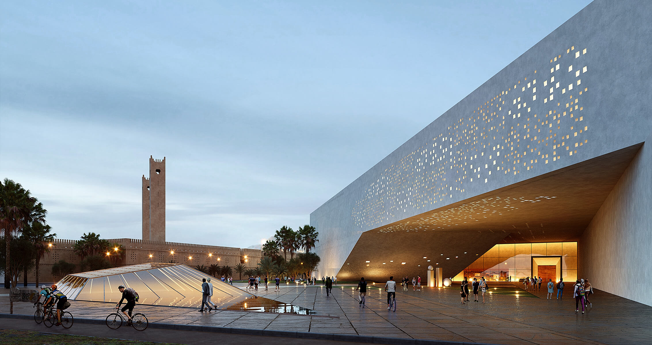 Modern architectural building with cyclists and tower at sunset.