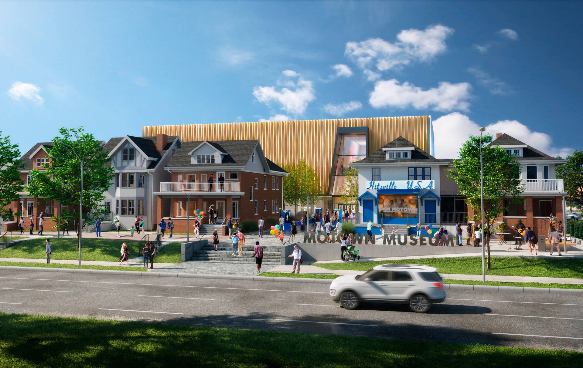 Museum exterior with people visiting, historic buildings, and modern architecture under a blue sky.