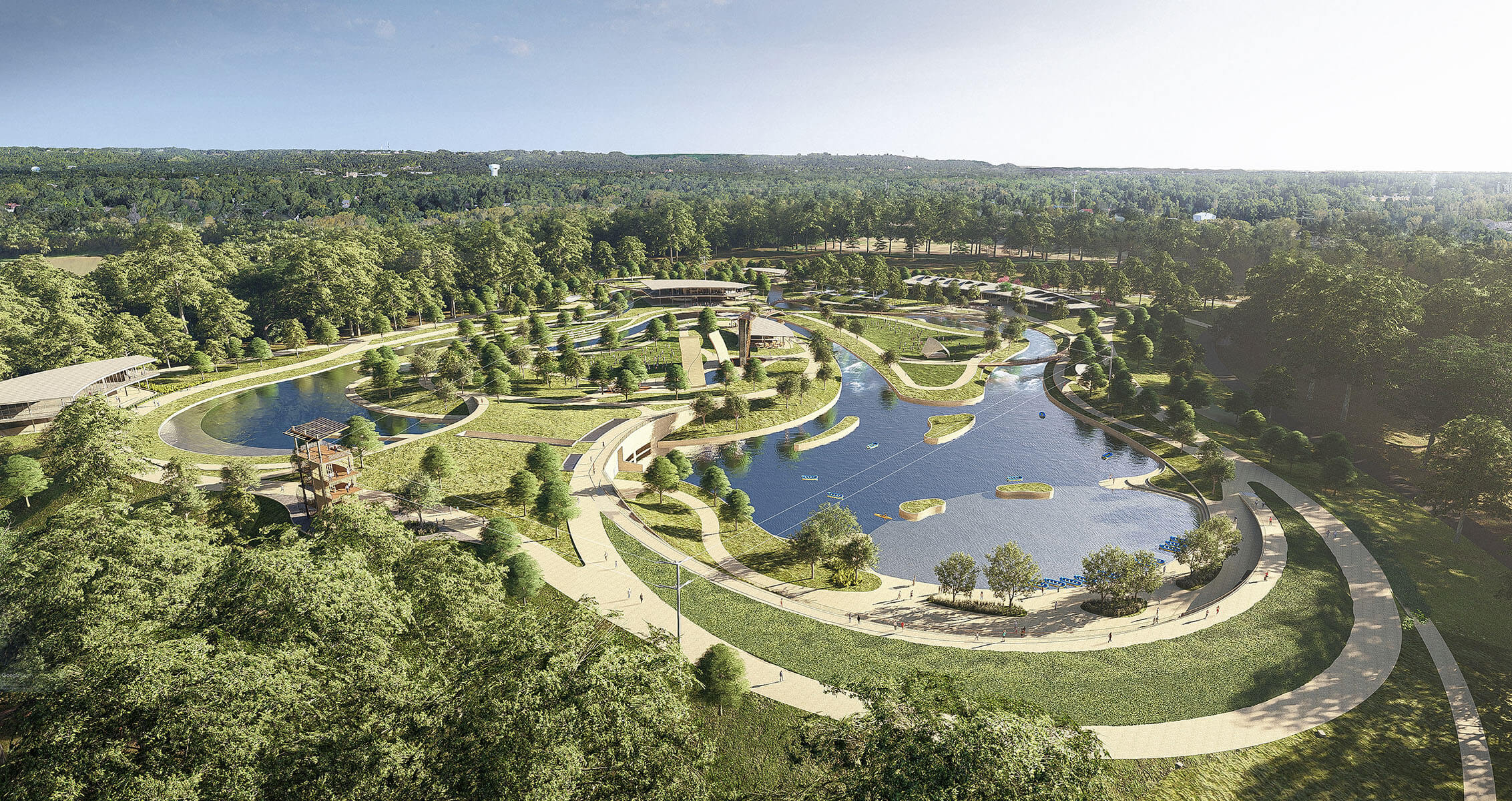 Aerial view of a green park with ponds, winding paths, and lush trees.