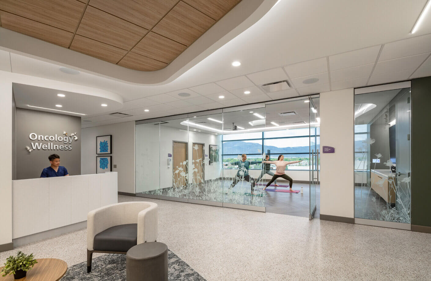 Oncology wellness clinic with yoga class in session.