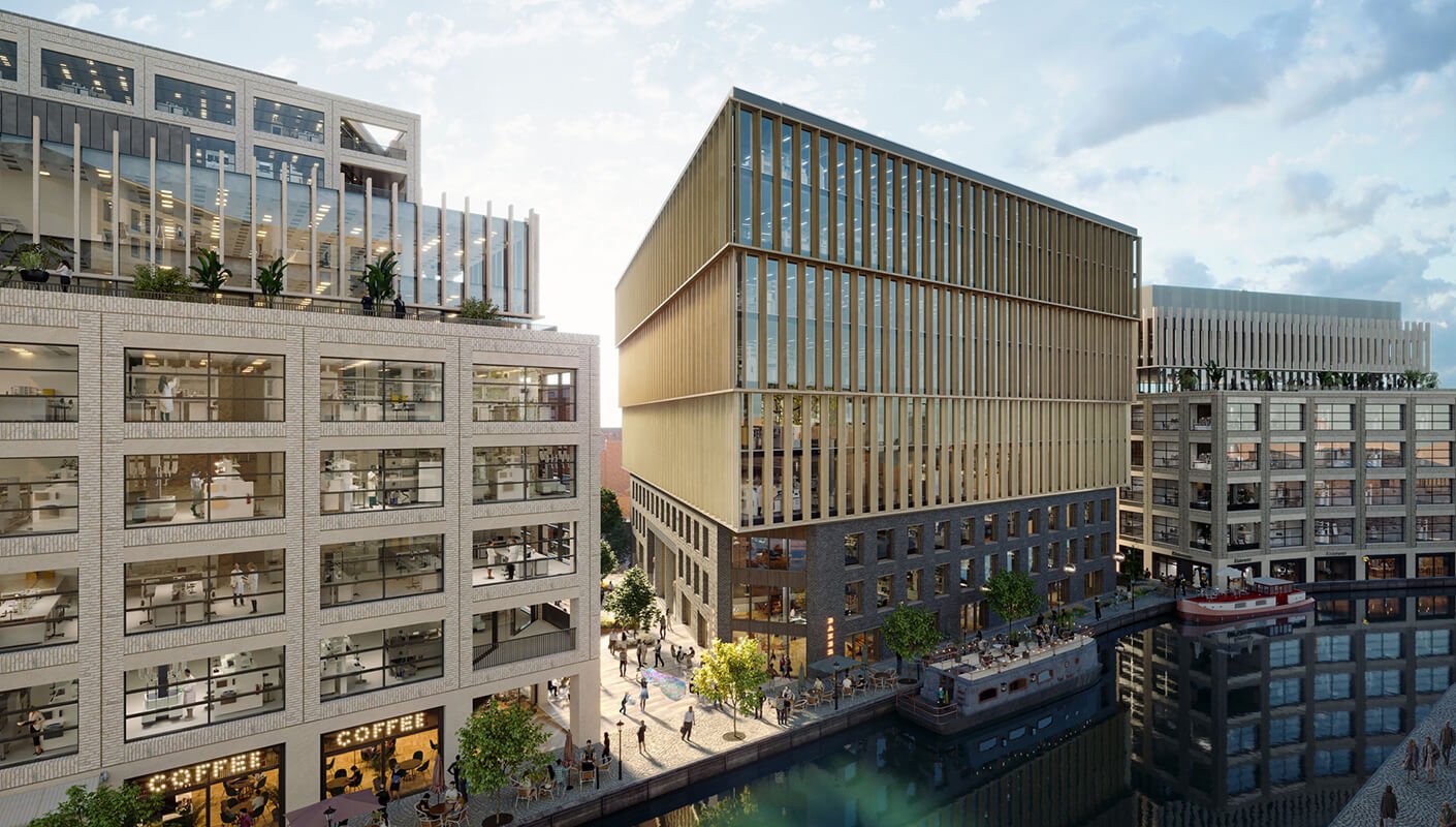 Modern office buildings along a riverside with people and cafes.