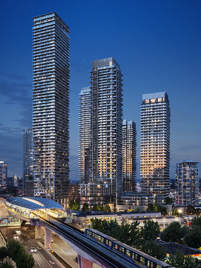 Modern skyscrapers at dusk with colorful lights and a nearby elevated train station.