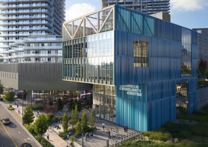 Modern community center with glass facade in urban development.