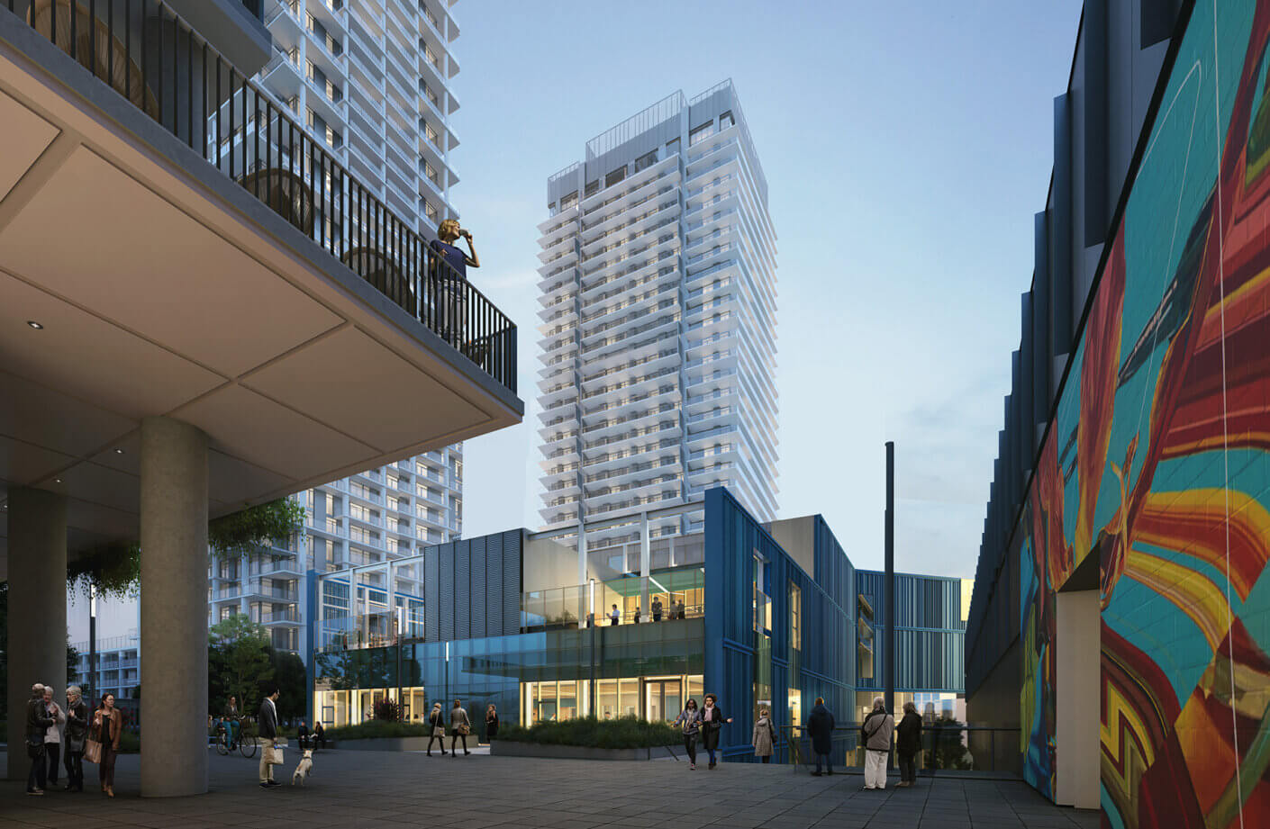 Modern urban plaza with high-rise buildings and colorful mural.