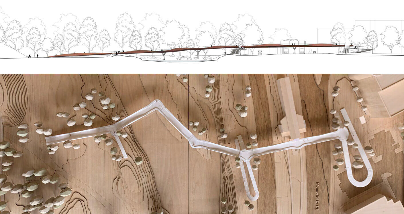 Architectural model with pathway and landscape elements.