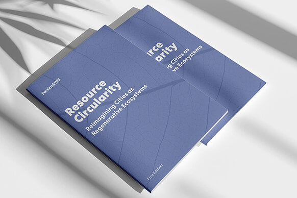 Brochure on Resource Circularity with a leaf-pattern cover placed on a light gray surface.
