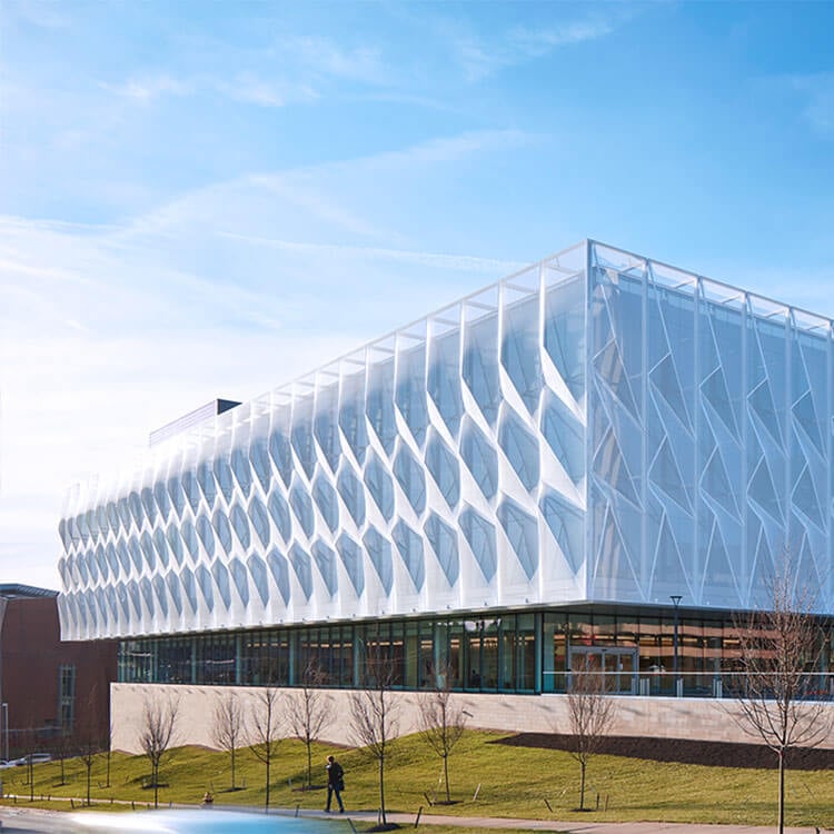 The UC Gardner Neuroscience Institute features modern architecture and an expansive glass facade.