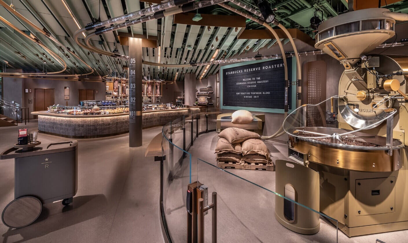 Modern Starbucks Reserve Roastery interior showcasing curved ceilings and sleek design.
