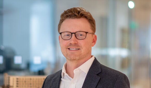 Headshot of Chris Karlson, Associate Principal at Perkins&Will