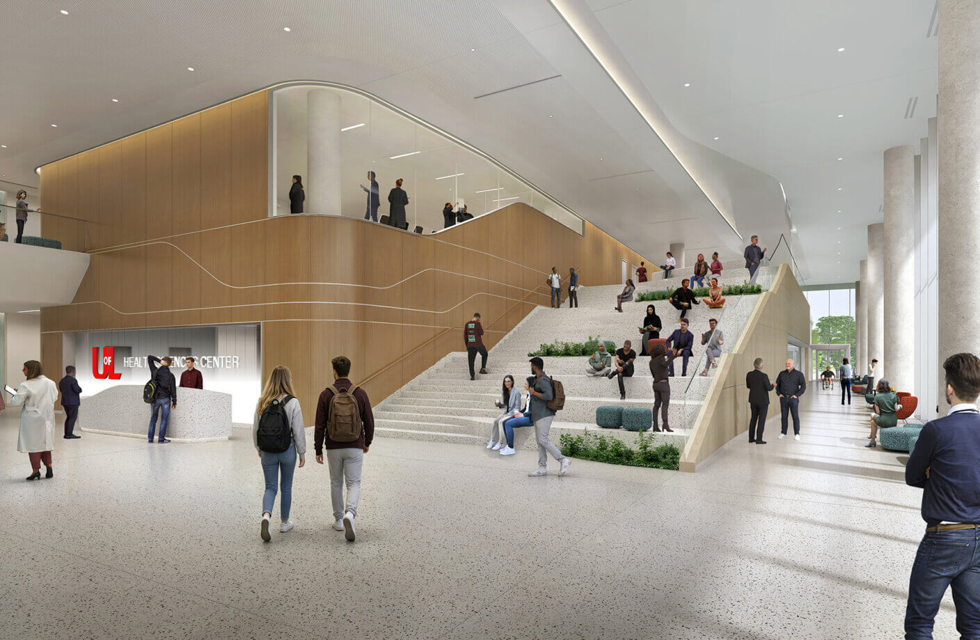 Interior view of the U of L Health Sciences Center lobby, featuring a staircase with greenery, seating areas, and students interacting.