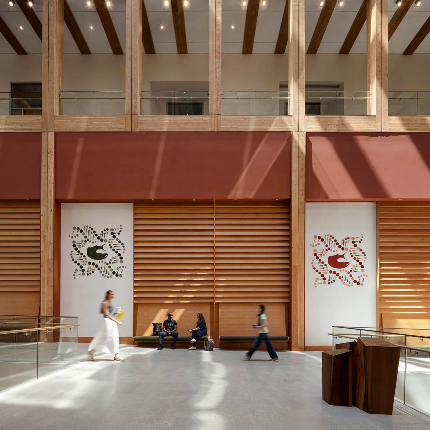 Interior daytime view showing Musqueam artwork in the UBC MacIsaac Health Building